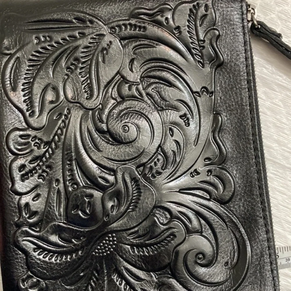 Patricia nash black embossed leather wristlet bag